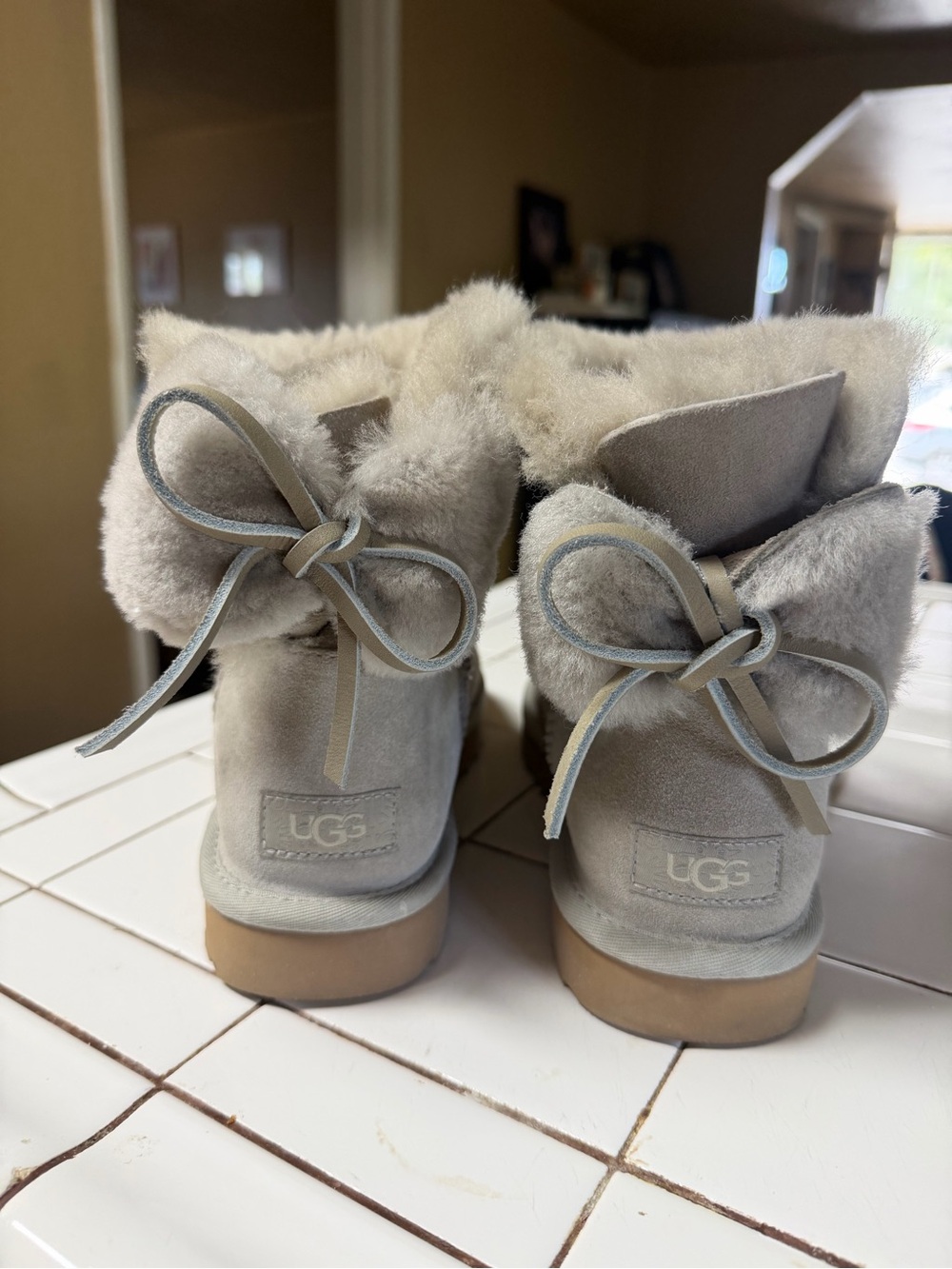 UGG Women's Shearling Bow Ankle Boots in Light Gray